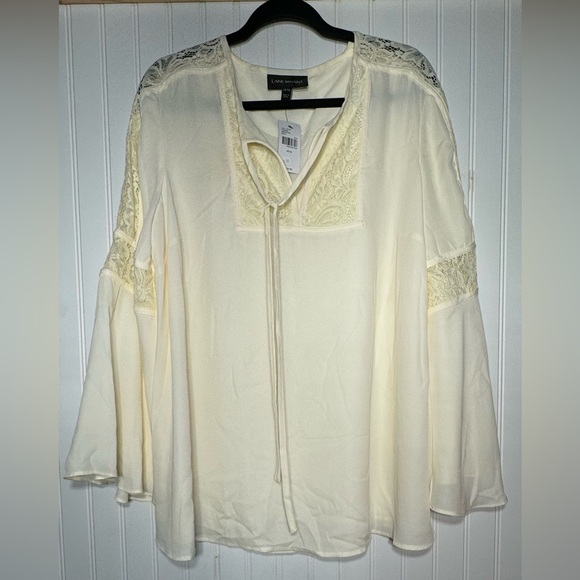 Lane Bryant Blouse sz 14/16 cream color w/lace bell sleeves small mark on front - Picture 1 of 6